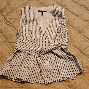 Cute top BCBG worn Once,  very low cut in front!